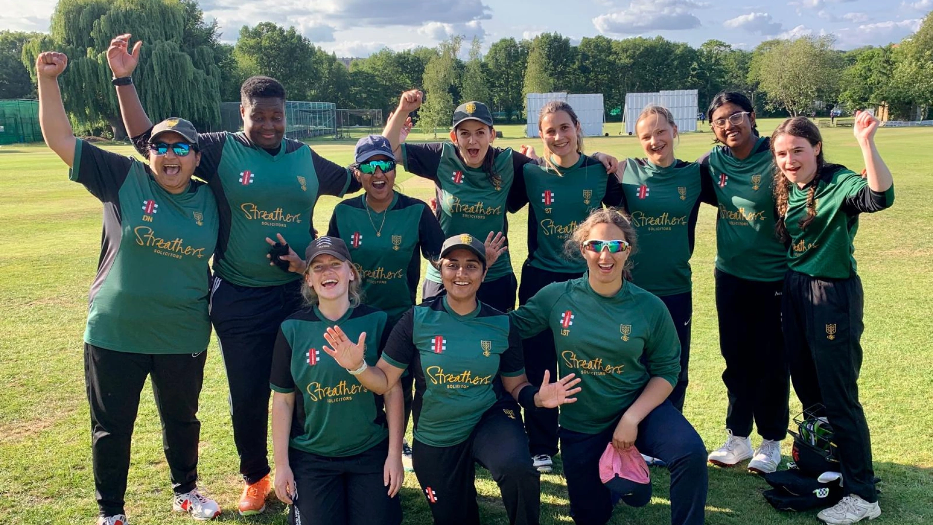 North London Women's Cricket team celebrating a victory on a lovely summer's day